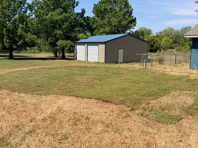 Fresh sod installed on the graded yard